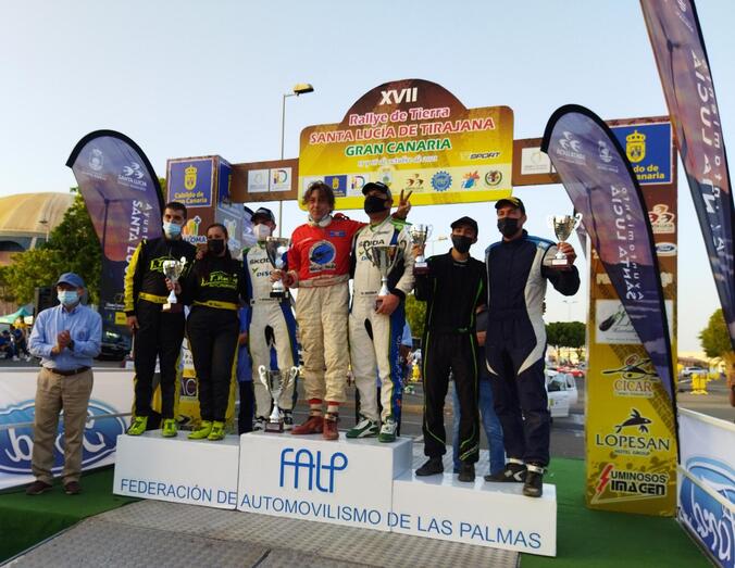 Paco romero arropado por el podio del pasado Rallye de Tierra SL