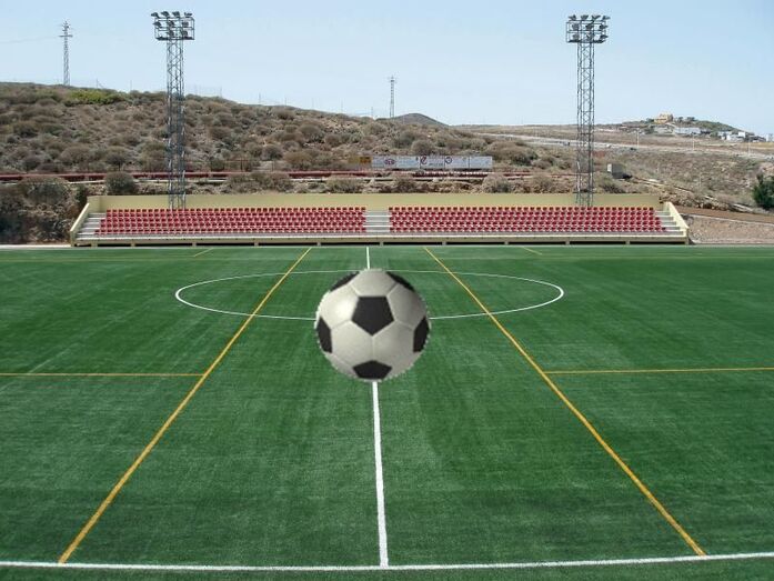 CAMPO DE FÚTBOL CON CÉSPED ARTIFICIAL